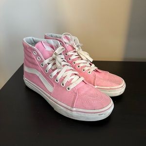 Bright pink high top vans